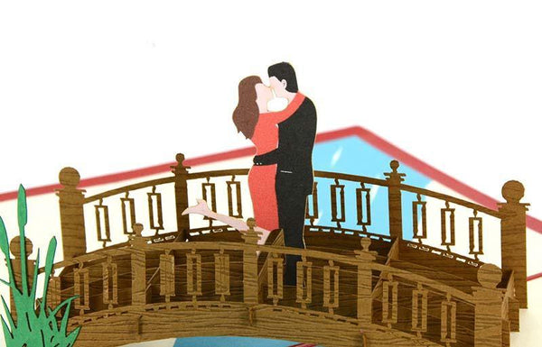 Couple kissing on bridge - Henry Pop-Up Cards